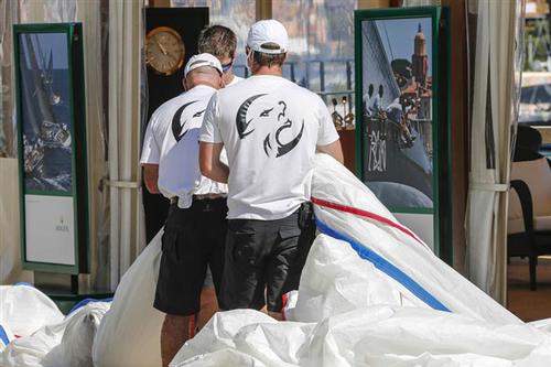 Crew members of Lupa of London (GBR) during sail measurement on Piazza Azzurra - 2013 Maxi Yacht Rolex Cup ©  Rolex / Carlo Borlenghi http://www.carloborlenghi.net